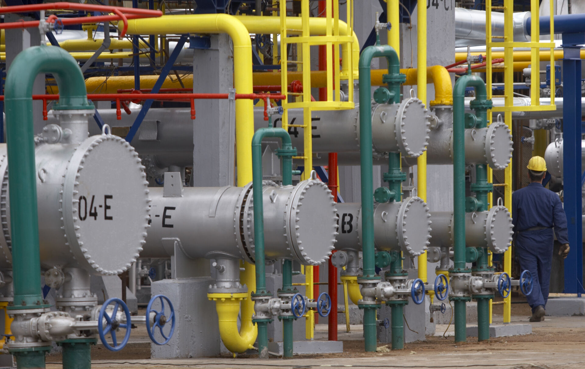 Coldcase industrial refrigeration pipework with coloured service lines and valve controls