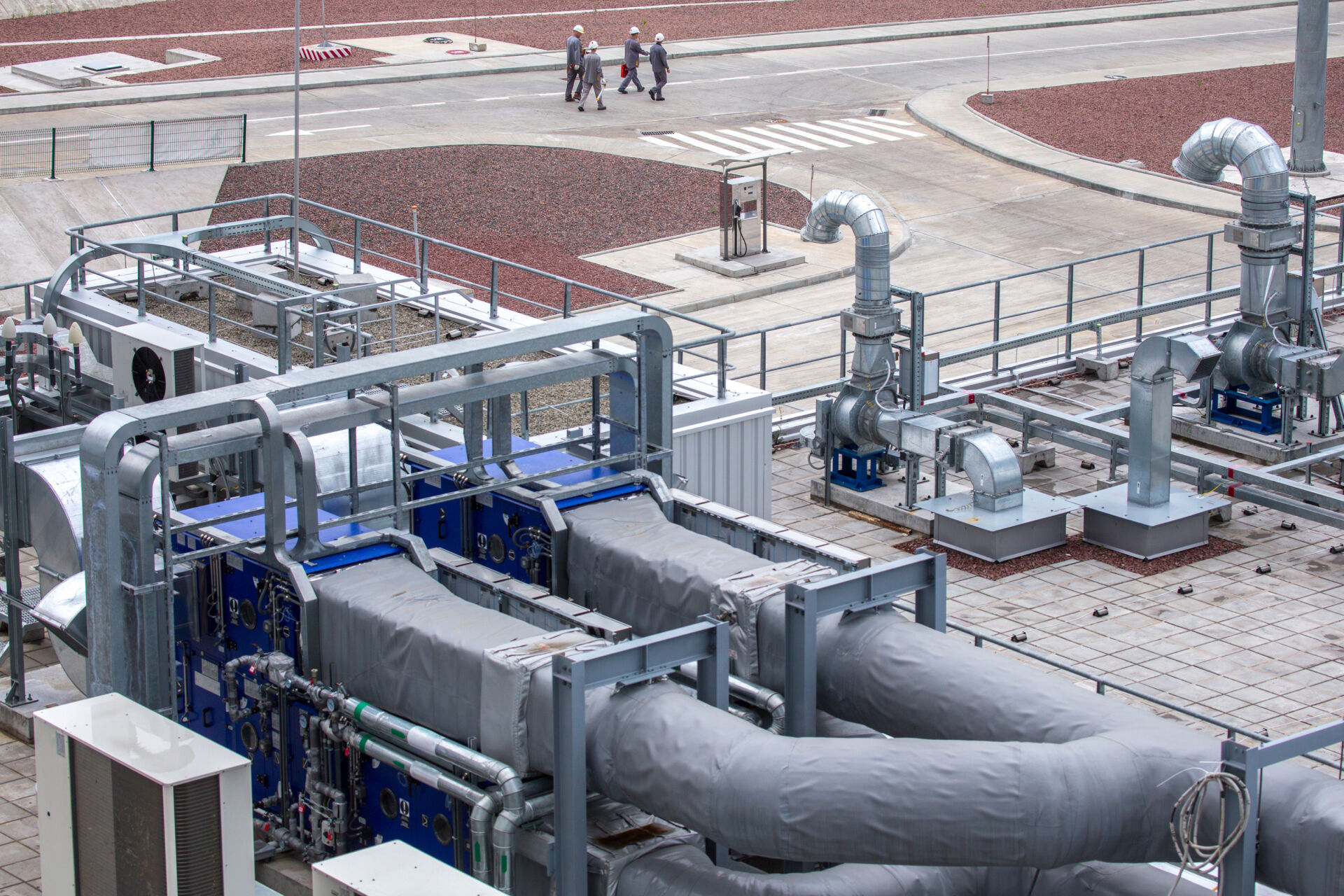 Coldcase exterior HVAC and refrigeration pipework serving a commercial building