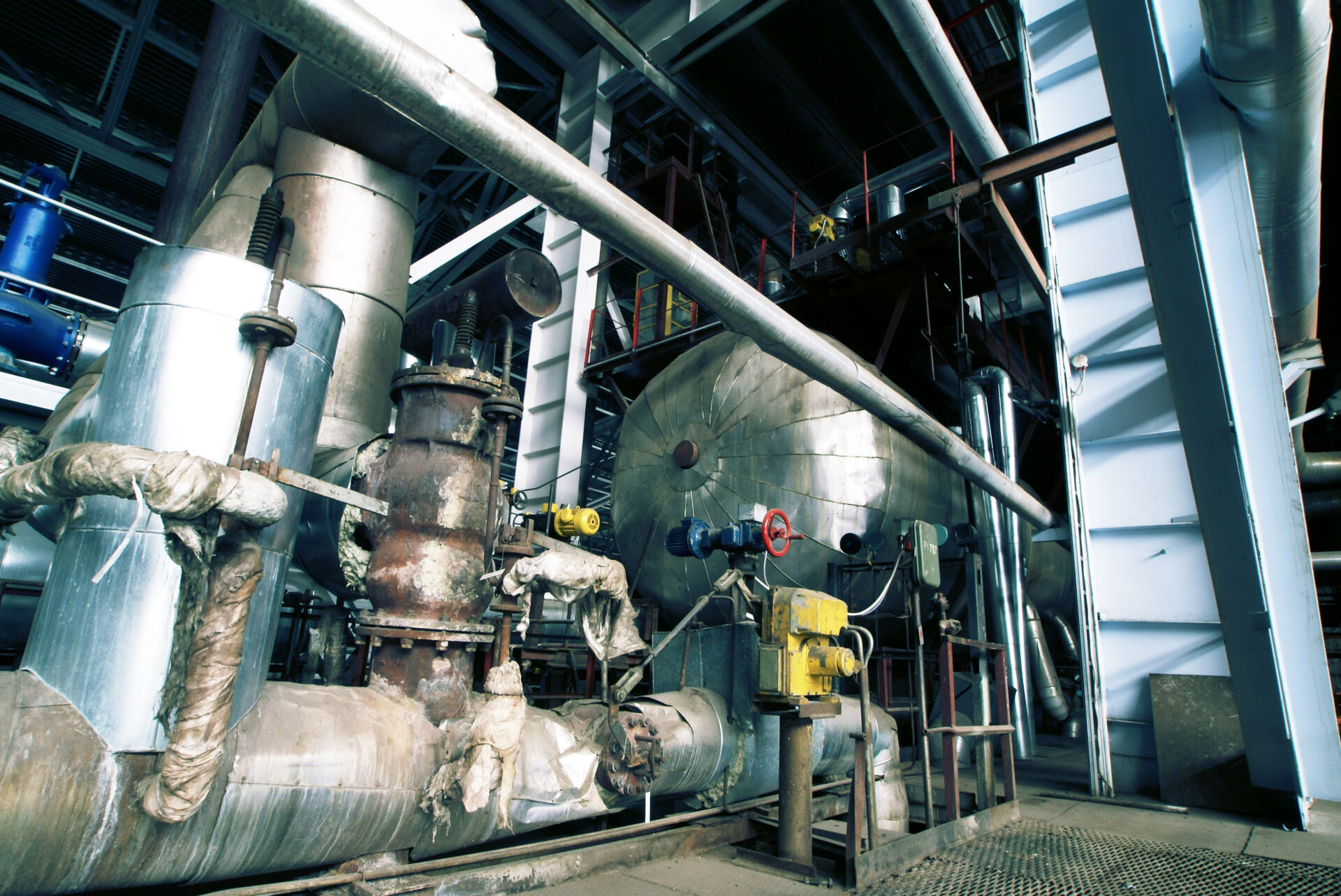 Coldcase industrial refrigeration installation with large steel pipes and plant room equipment