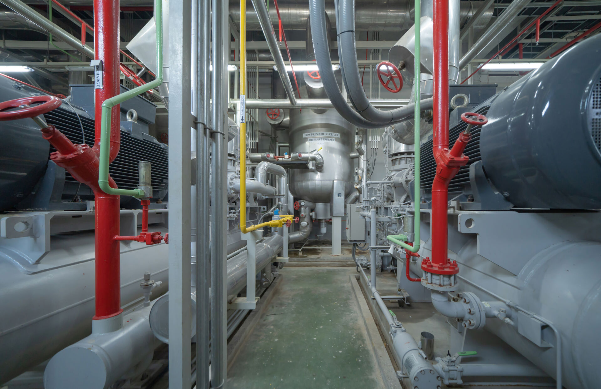 Coldcase industrial refrigeration plant with chillers, pipework and safety-marked valves